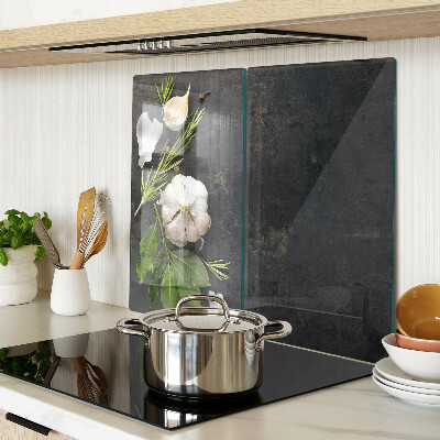 Glass chopping board Flowers and herbs on a marble background