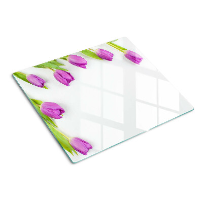 Glass chopping board Tulips on a white background