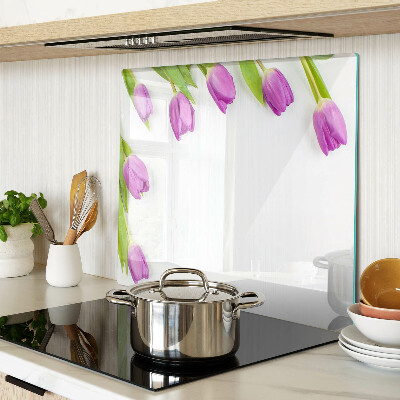 Glass chopping board Tulips on a white background