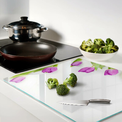 Glass chopping board Tulips on a white background