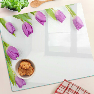Glass chopping board Tulips on a white background