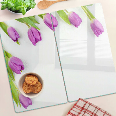 Glass chopping board Tulips on a white background