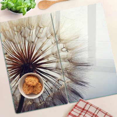 Glass kitchen board Dandelions in the light