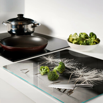 Glass kitchen board Fluffy dandelions on a monochromatic background