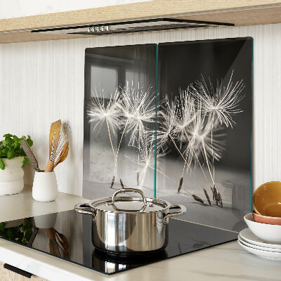 Glass kitchen board Fluffy dandelions on a monochromatic background