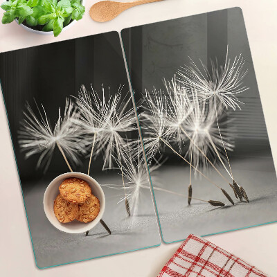 Glass kitchen board Fluffy dandelions on a monochromatic background