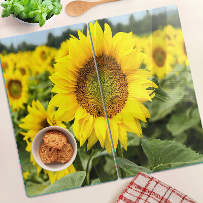 Glass chopping board Sunflowers against a green background