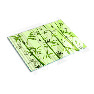 Glass kitchen board Bamboo on green background