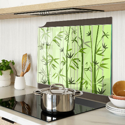 Glass kitchen board Bamboo on green background
