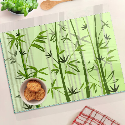 Glass kitchen board Bamboo on green background