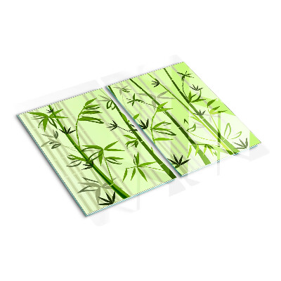Glass kitchen board Bamboo on green background