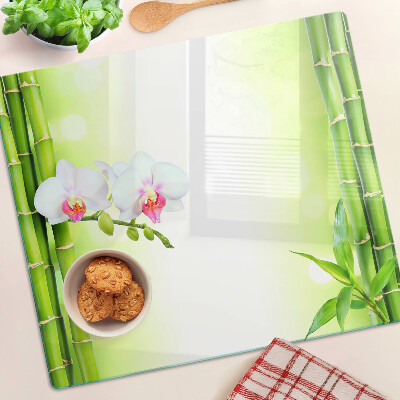 Glass kitchen board Orchids and bamboo