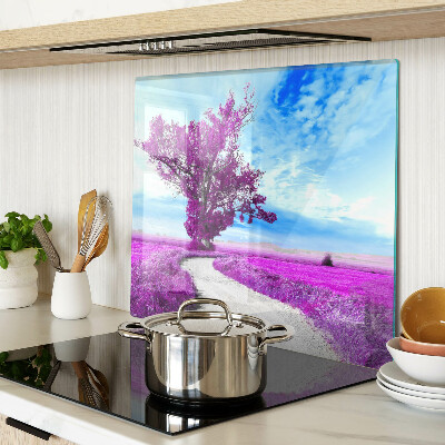 Glass kitchen board Purple tree against the sky