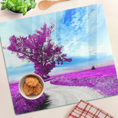Glass kitchen board Purple tree against the sky