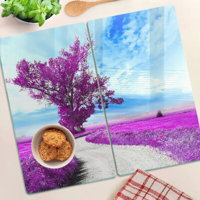 Glass kitchen board Purple tree against the sky