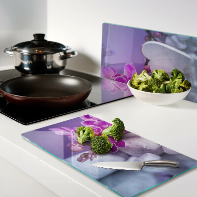 Glass chopping board Orchids on stones