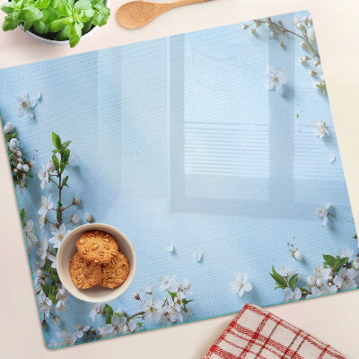 Glass chopping board Floral pattern on a blue background
