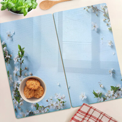 Glass chopping board Floral pattern on a blue background