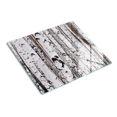 Glass chopping board White trunks of birch trees