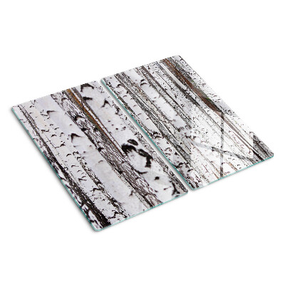 Glass chopping board White trunks of birch trees