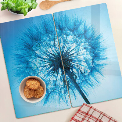 Glass chopping board Dandelion on a blue background