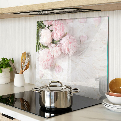 Glass kitchen board Peony flowers on a marble background