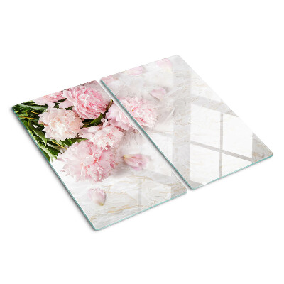 Glass kitchen board Peony flowers on a marble background