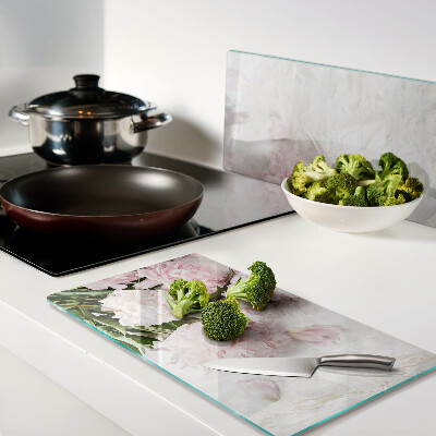 Glass kitchen board Peony flowers on a marble background