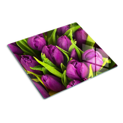 Glass kitchen board Purple tulips with green leaves