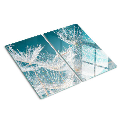 Glass chopping board Dandelions on a blue background