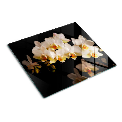 Glass chopping board Orchids on a black background