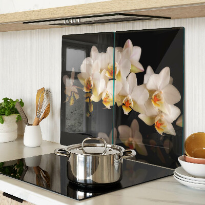 Glass chopping board Orchids on a black background
