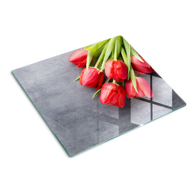 Glass kitchen board Tulips on a gray background