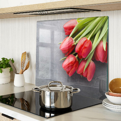 Glass kitchen board Tulips on a gray background