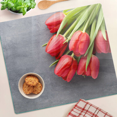Glass kitchen board Tulips on a gray background