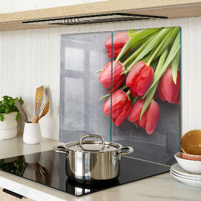 Glass kitchen board Tulips on a gray background