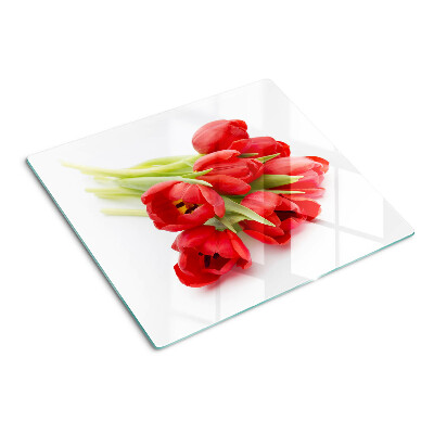 Glass kitchen board Red tulips on a white background