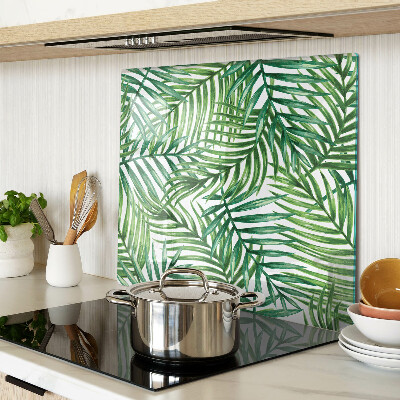 Glass kitchen board Palm leaves in shades of green