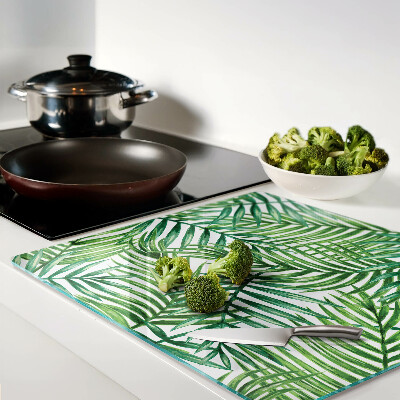 Glass kitchen board Palm leaves in shades of green