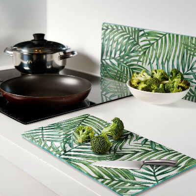 Glass kitchen board Palm leaves in shades of green