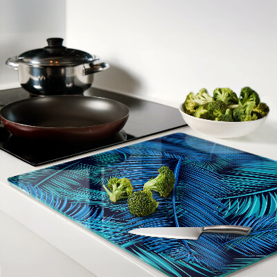 Glass kitchen board Palm leaves in shades of blue