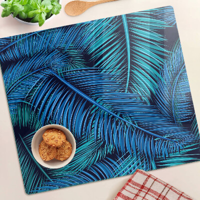 Glass kitchen board Palm leaves in shades of blue