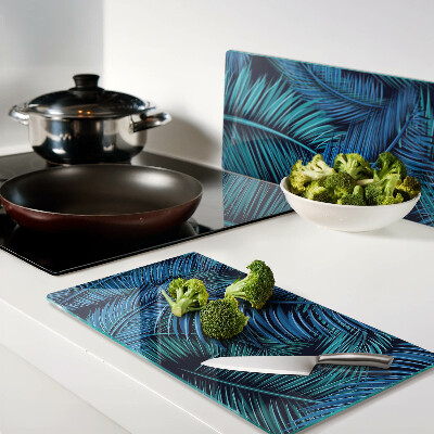 Glass kitchen board Palm leaves in shades of blue