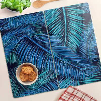 Glass kitchen board Palm leaves in shades of blue