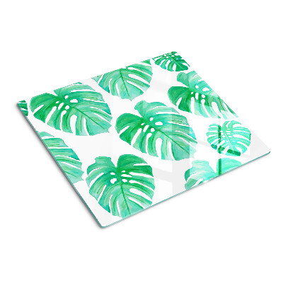 Glass kitchen board Monstera leaves on a white background