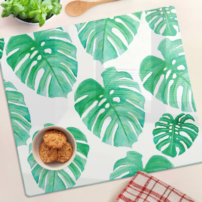Glass kitchen board Monstera leaves on a white background