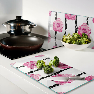 Glass kitchen board Roses on a black line background