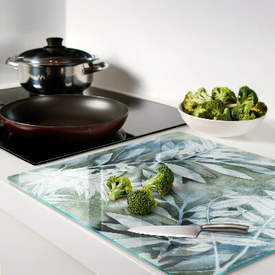 Glass kitchen board Tropical leaves in pastel shades