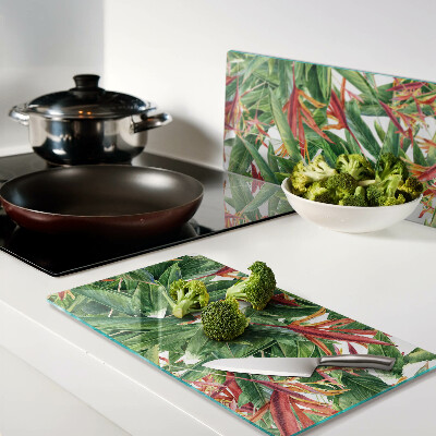 Glass kitchen board Tropical leaves and flowers