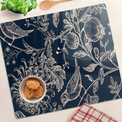 Glass chopping board Flowers and birds on a dark background